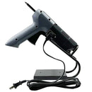 Side view of FLEX 50 PUR glue gun on black metal stand, perfect for keeping tools upright and workspaces neat.