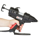TEC 3400 hot melt glue gun being used