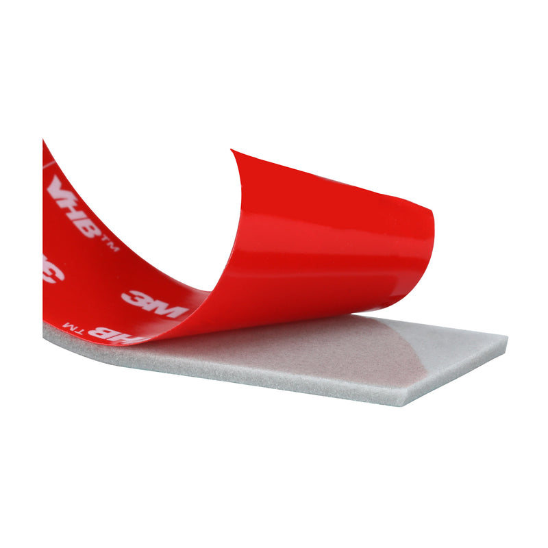 Close-up detail of 3M VHB Max-230GF foam tape with liner partially lifted from adhesive surface.