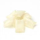 H.B. Fuller HL6278 hot melt adhesive in translucent pillow form used for repositionable industrial bonding applications.