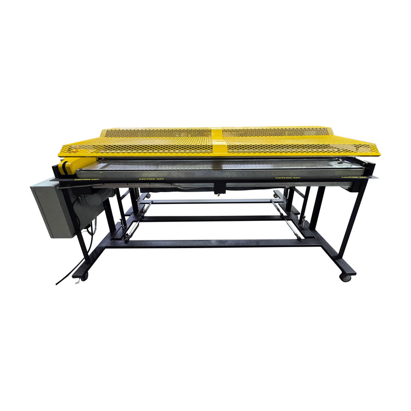 Front view of large format industrial hot melt roll coater with yellow safety guard and steel roller system