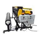 Side of large roll coater with integrated control panel, speed adjustment knobs, and roll-fed material setup