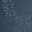 Swirl spray pattern of hot melt adhesive demonstrating uniform coverage for packaging and product assembly applications