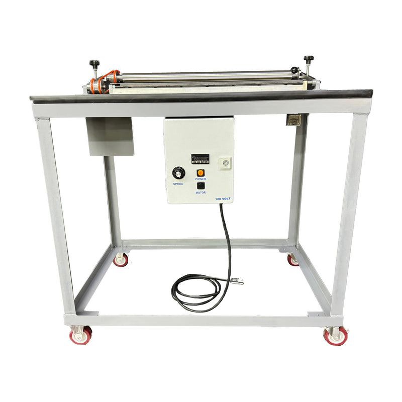 Front view of hot melt roll coater mounted to table with wheels for mobility