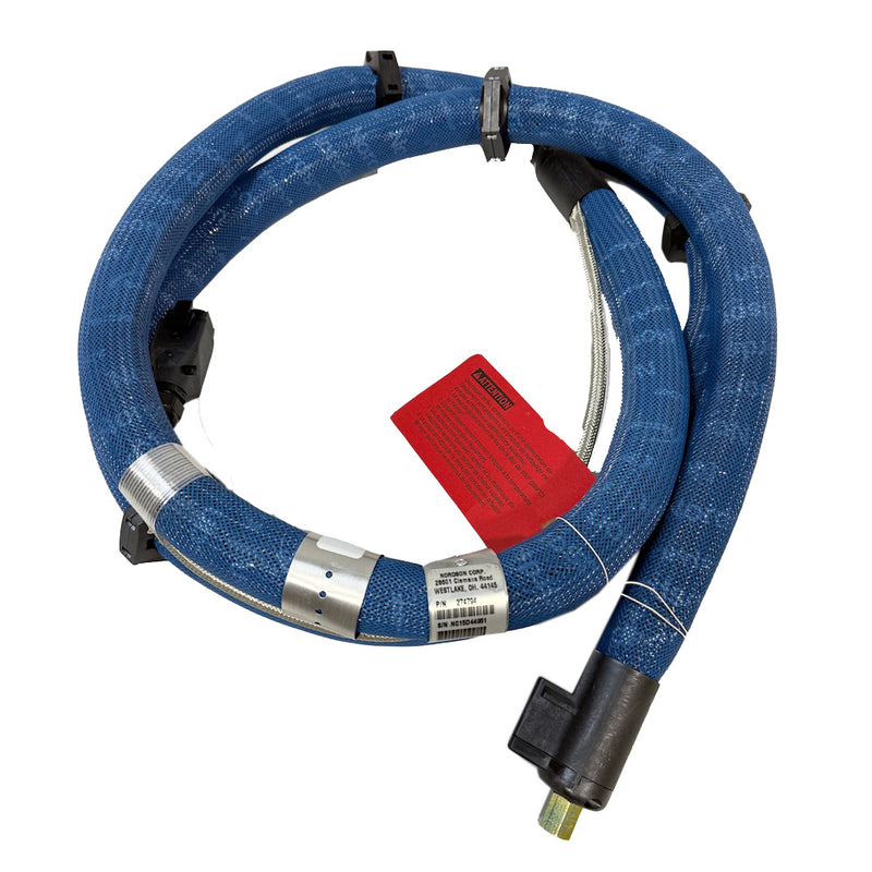 Nordson 274794 blue braided hot melt hose with red warning tag and metal fitting connectors.
