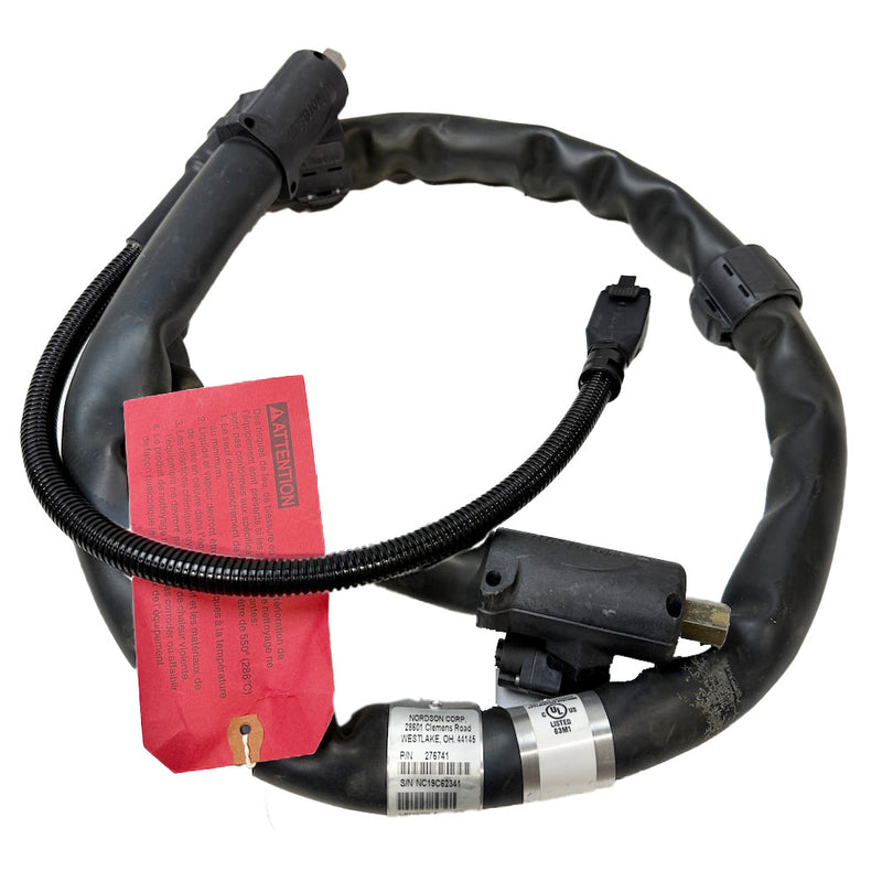 Nordson 276741 black water wash hot melt hose with molded ends and prominent part ID tag.