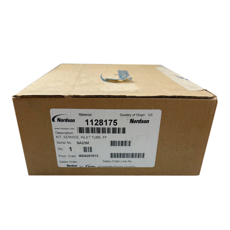 Sealed cardboard box labeled with Nordson 1128175 part number, showing product details