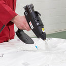 Hot melt spray adhesive from a Tec 6300 glue gun used to secure and stabilize packaged products on a pallet.