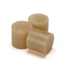 Pale amber Casttec 42 hot melt glue slugs used for precast concrete to bond wood, plastic, metal, and foam to mould bases.