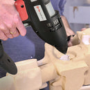 Adhesive is dispensed into a shaped component using the Power Adhesives Tec 3500 during an assembly process.