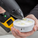 Dispensing hot melt adhesive onto a plastic component using the Power Adhesives Tec 3508 cordless glue gun during a precision application.