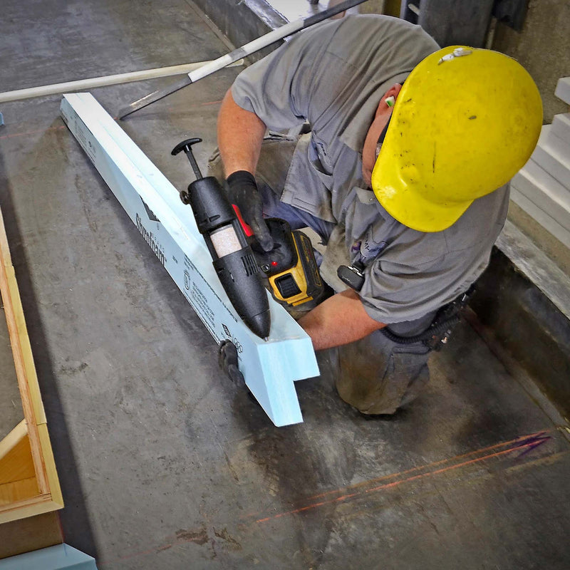 Worker using Power Adhesives TEC 3508 on the job site