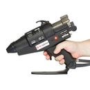 A professional user holding the Tec 6300 spray applicator, highlighting the ergonomic handle, trigger reach, and stable base design.