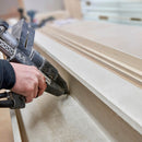 During a woodworking application, adhesive is applied to a panel edge with the Tec 7100 hot melt glue gun from Power Adhesives.