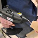 Dispensing adhesive onto a wood surface using the Tec 7100 pneumatic hot melt applicator by Power Adhesives.