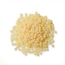Tecbond 110B bulk hot melt pellets shown on white background, designed for high-output packaging lines