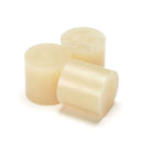 Tecbond 550 hot melt glue slugs in 43mm format, translucent adhesive blocks photographed on white background