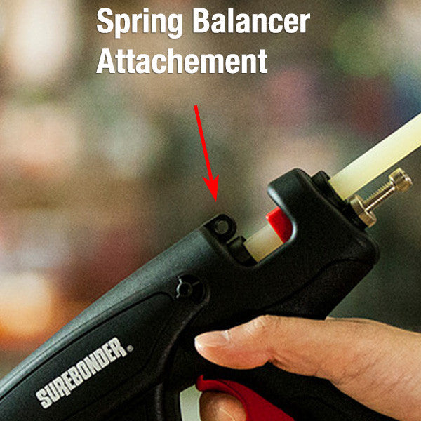 Tool Balancer attachment on a hot melt glue gun.