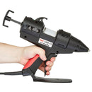 TEC 3400 hot melt glue gun being used